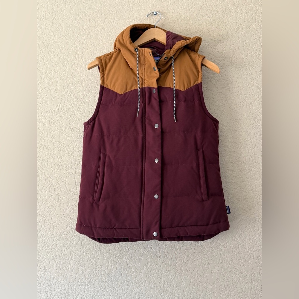 Patagonia Women's Bivy Hooded Down Vest in the Dark Ruby, sz SM